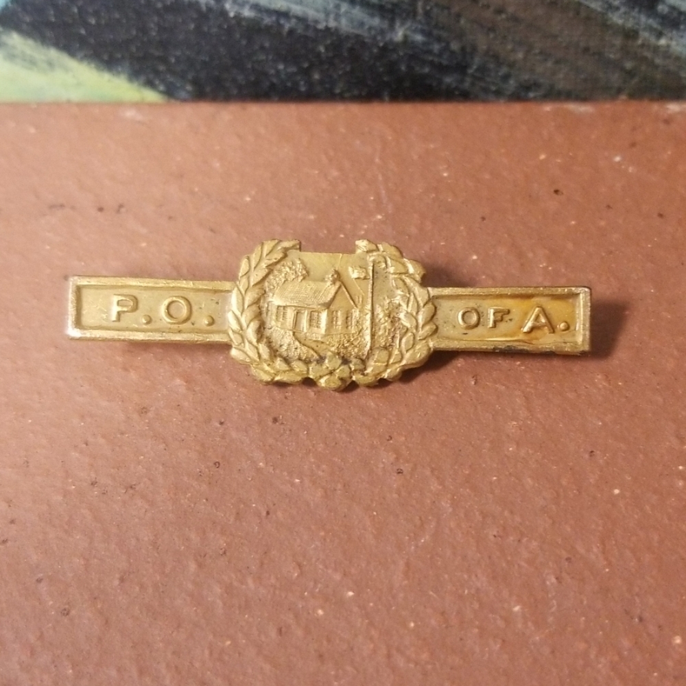 Vintage brass Brooch it says P.O of A